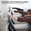 hochwertige Pilates Socken im Herzdesign am Reformer Gerät
