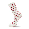 Pilates Socke in beige mit roten Herzen über die ganze Socke verteilt